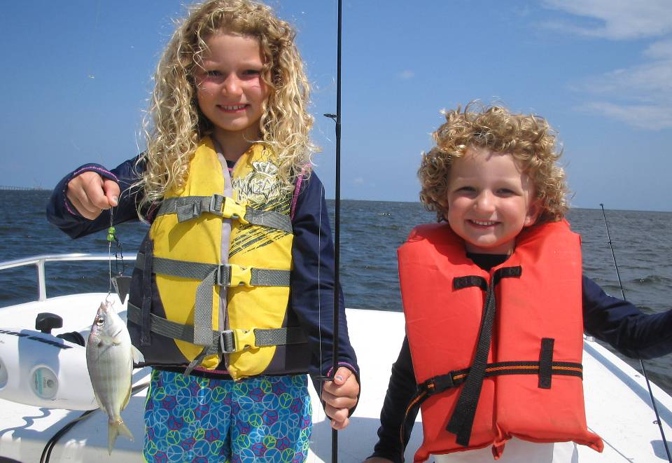 family on an OBX fishing charter